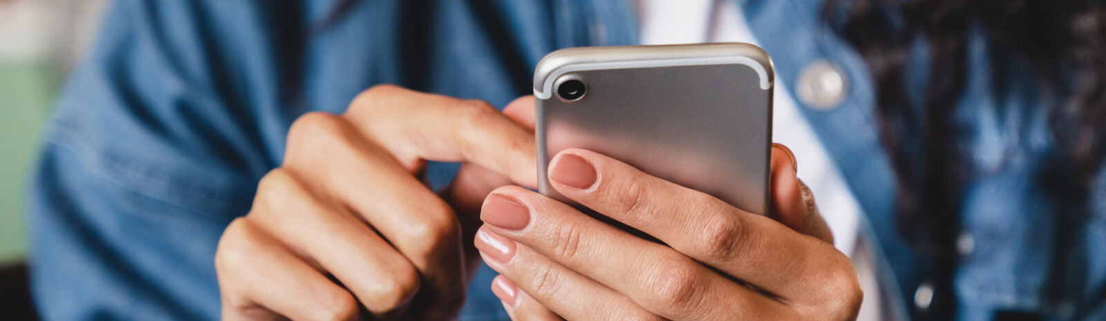 woman holding mobile phone